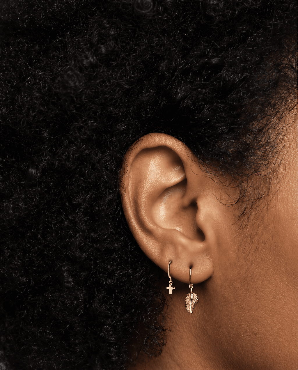 The Mini Cross - 18K yellow gold hoop earrings and a mini cross charm