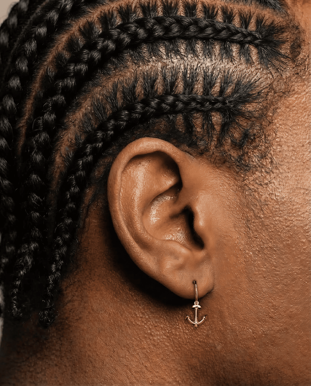 The Anchor - 18K yellow gold hoop earrings and an anchor charm